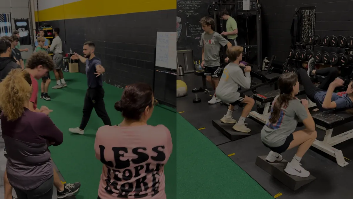 Adults working out inside the TNL Performance Hamilton training facility